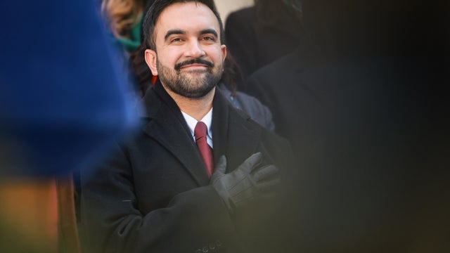 Mayor-elect Zohran Mamdani speaks before helping distribute 