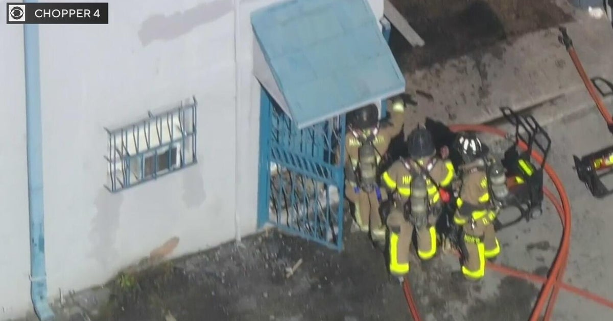 Fire crews race to extinguish North Miami warehouse blaze