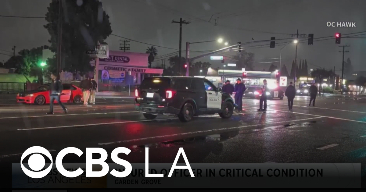 Garden Grove police officer hit by car during foot pursuit, critically injured