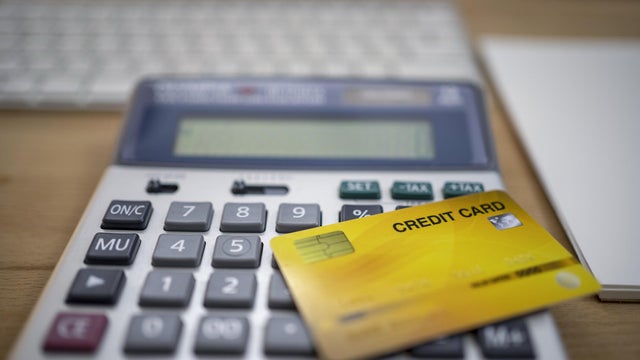 Credit card and calculator.Shopping online concept. 