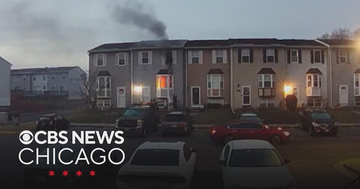 Hero neighbor rescues family from fire in Baltimore - CBS Chicago