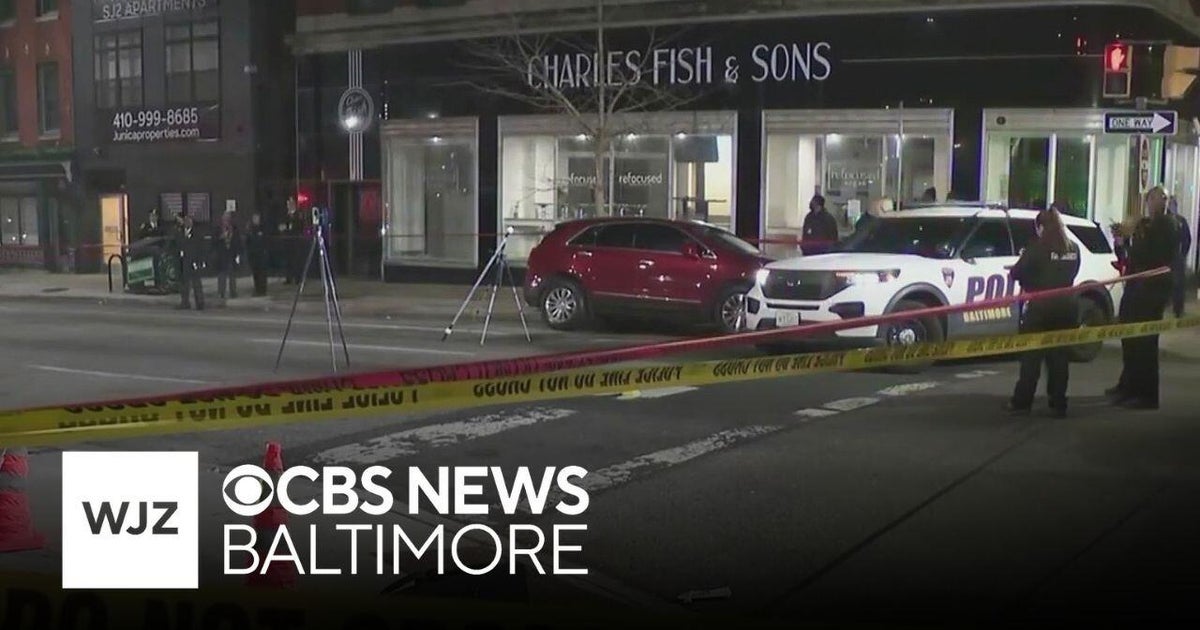 Baltimore police officer dragged, man shot during traffic stop - CBS ...