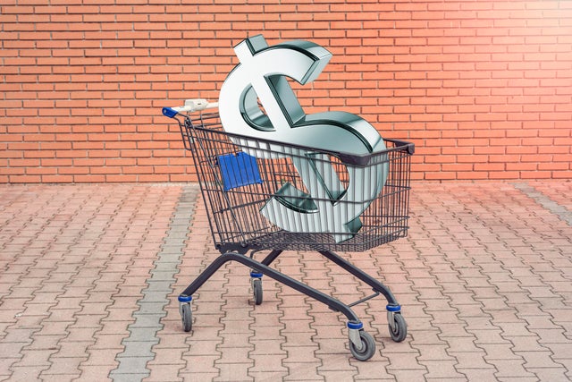 Dollar sign in shopping cart 