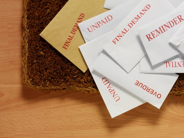 Envelopes and Bills on the Doormat 