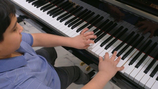 Payam student at the piano 