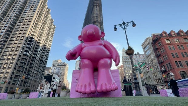 Mr. Pink sculpture in park 