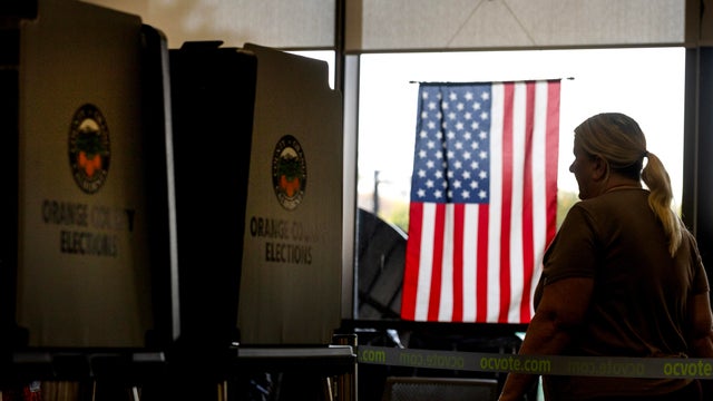 Voters cast their ballot in the California Statewide Special Election 