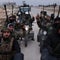 Syrian government forces enter northern towns; Kurdish fighters withdraw