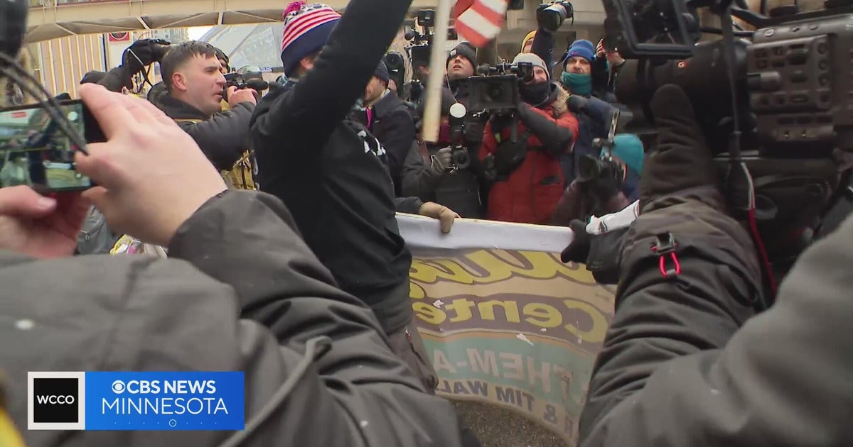 Small group of anti-Islam protesters met by large crowd of counterprotesters in downtown Minneapolis