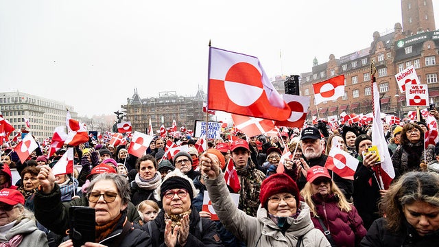 Protesters wave Greenland flags during a demonstration at City Hall Square in Copenhagen on Jan. 17, 2026. 