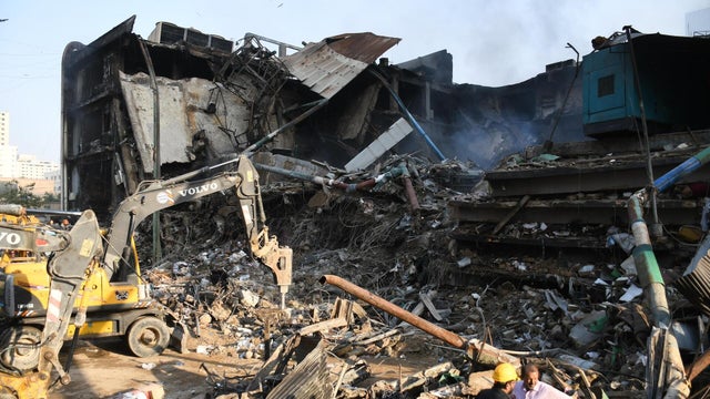 Death toll climbs to 14 in Pakistan shopping center fire, dozens missing 