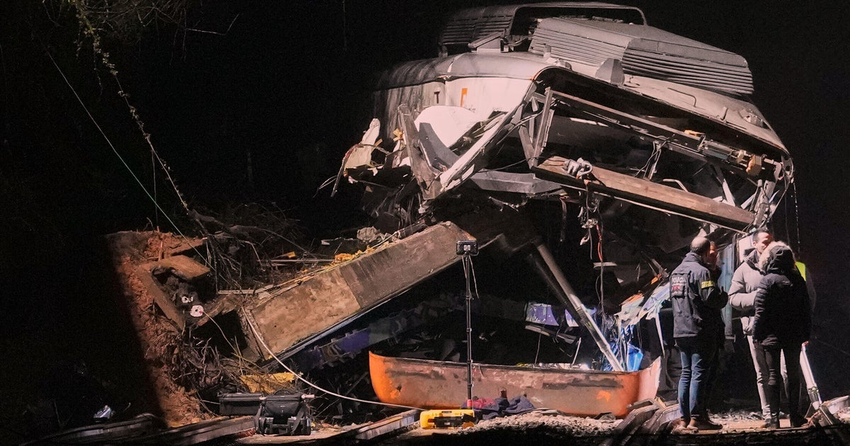 Commuter train in Spain hits collapsed wall, killing at least 1 person