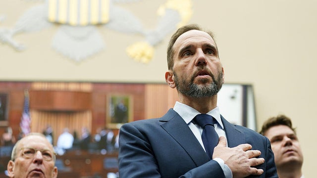 Former special counsel Jack Smith recites the pledge of allegiance before testifying before the House Judiciary Committee in Washington, D.C., on Jan. 22, 2026. 