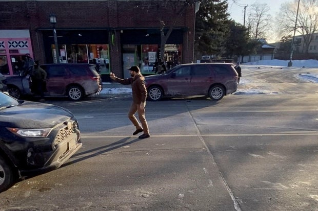 Moments before a man was shot when federal agents were trying to detain him in Minneapolis 