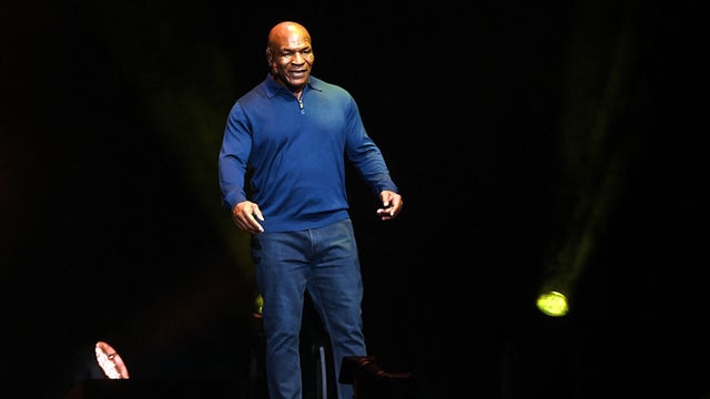 People post for photos at Mike Tyson's tour stop in Atlantic City 