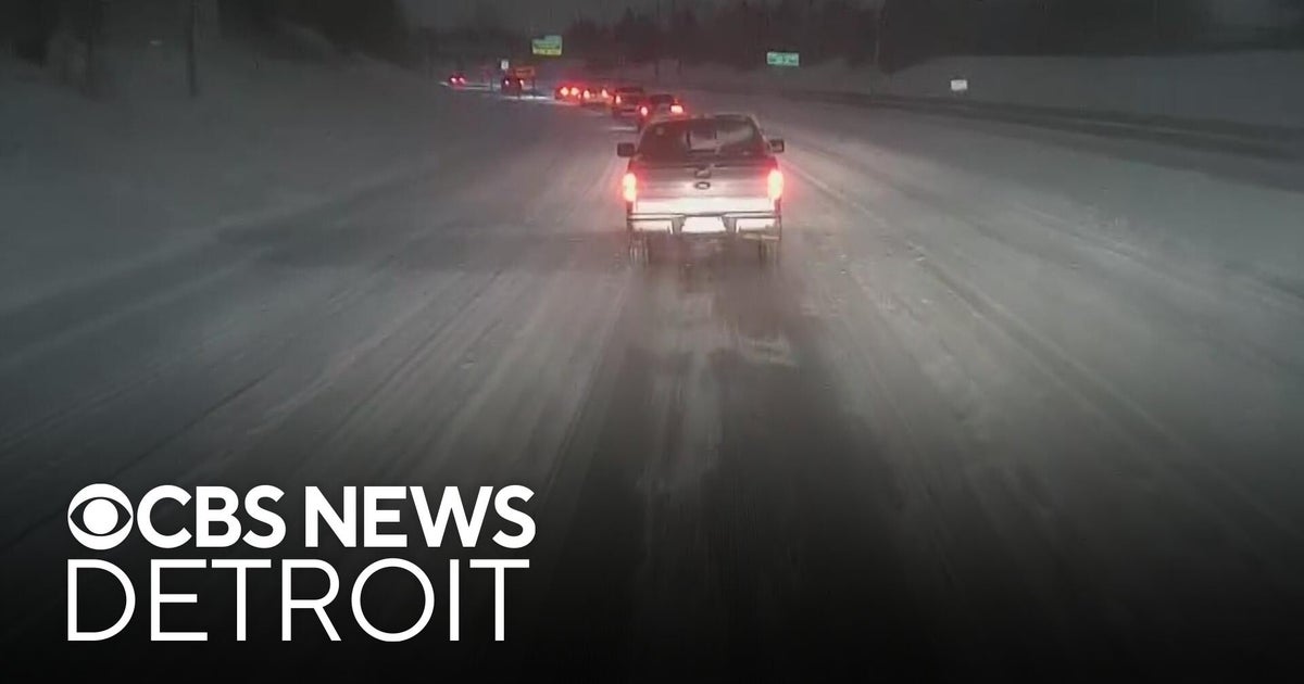 Metro Detroit residents deal with snow-covered roads during storm