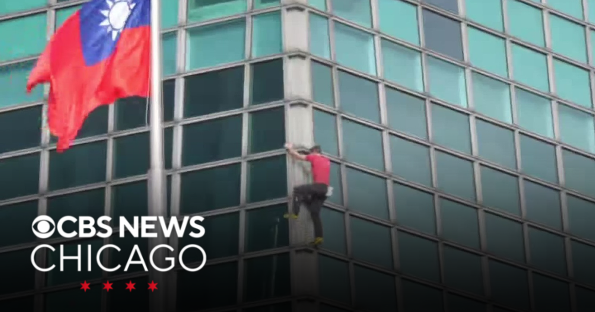 Alex Honnold reached top of Taipei 101 above the Taiwanese capital