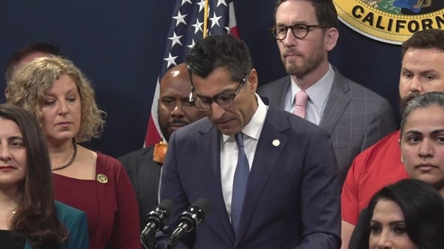 A man speaking at a podium 