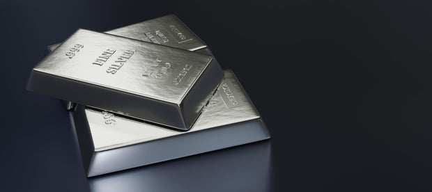Close up view of Silver bars or ingots in bank vault background. Precious metal.3D illustration 