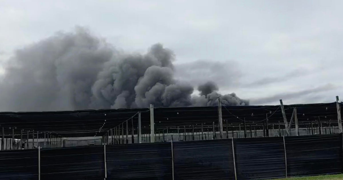 Crews working to extinguish large fire in Southwest Miami-Dade