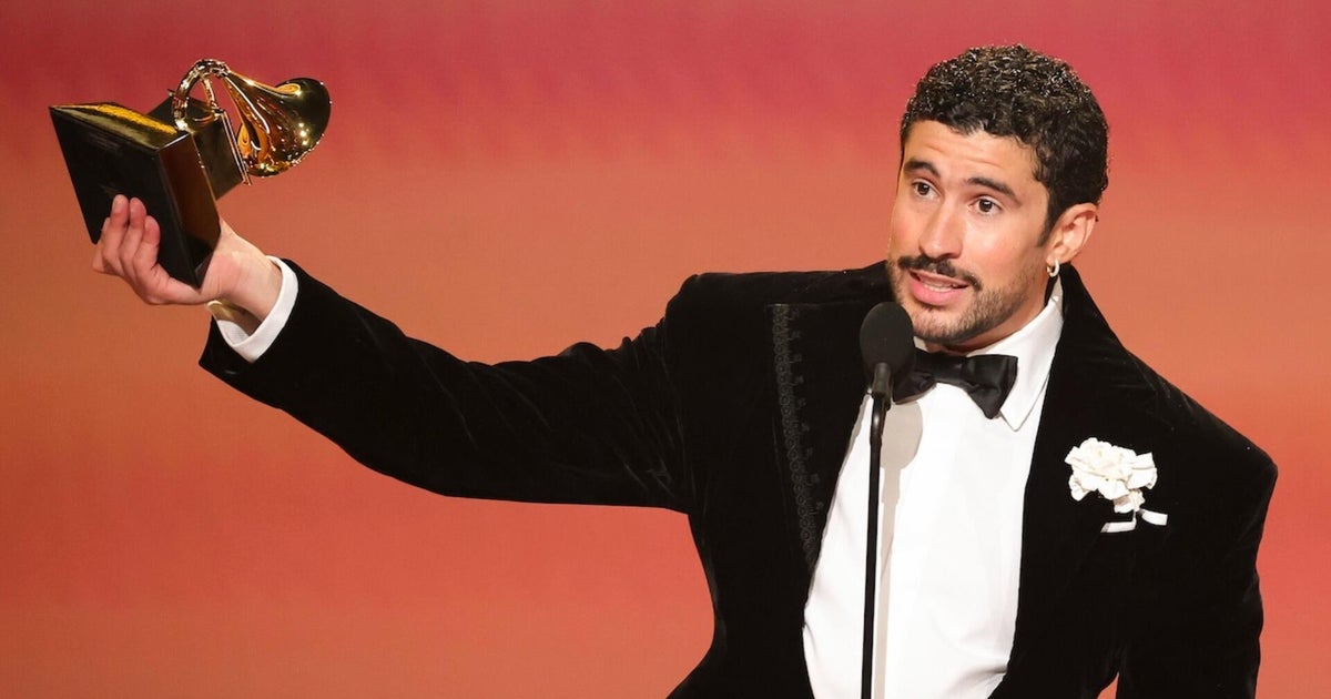 Bad Bunny wins Album of the Year at Grammys as he and other stars protest ICE