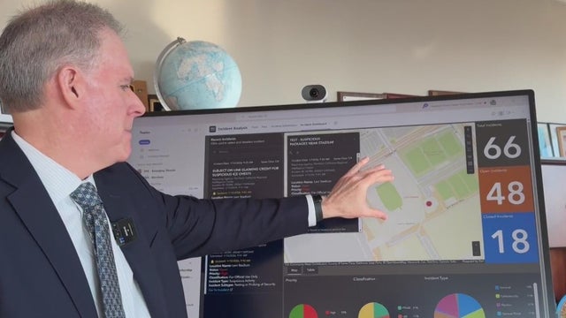 A man using an interactive screen 