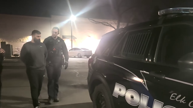 Police car with bright lights and siren 