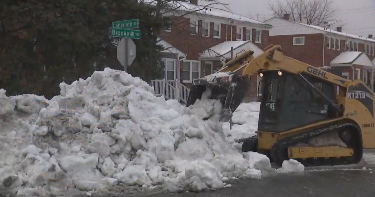 Ice covers many Baltimore sidewalks as arctic cold front moves in, power outage risk across Maryland grows
