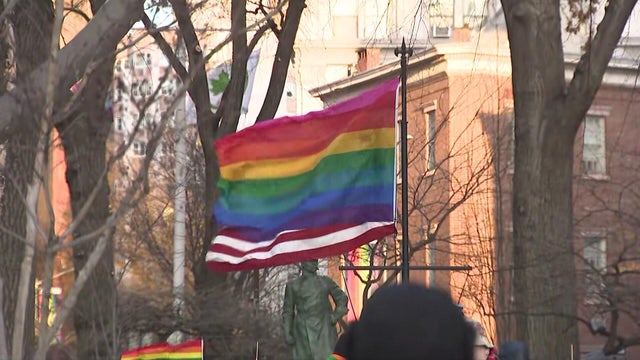 The Pride flag flying alongside the American flag at Stonewall National Monument 