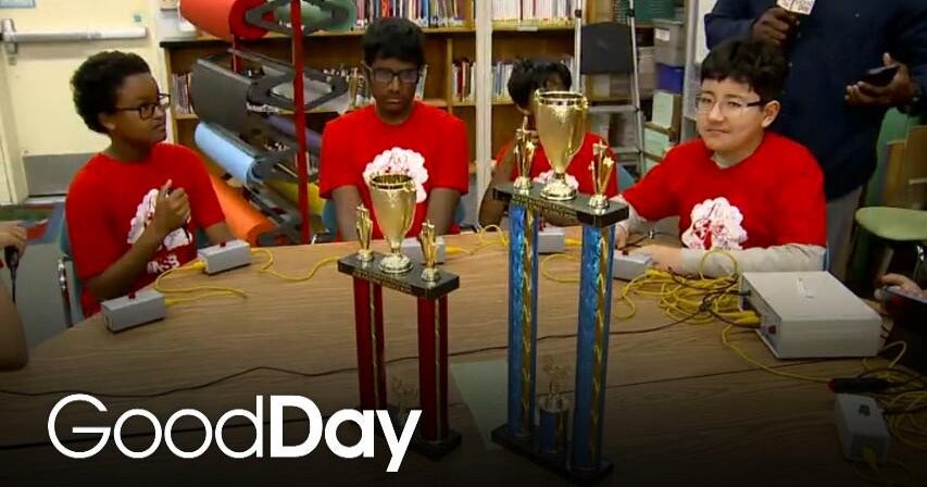 Students meeting a political figure after winning a regional science competition