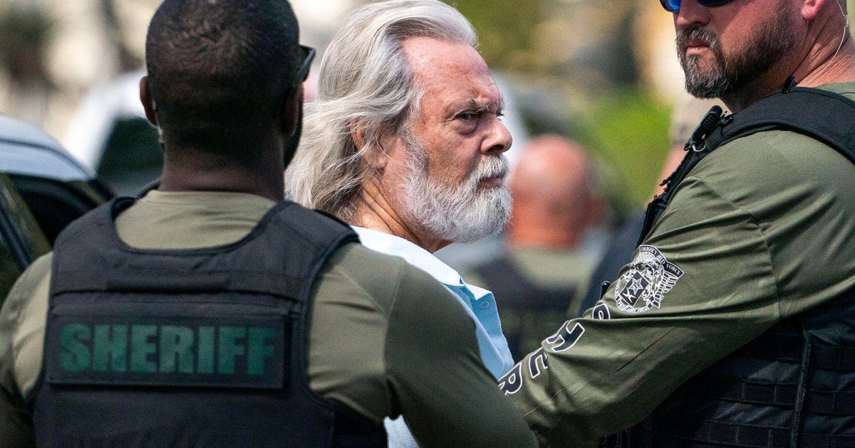 Man accused of hitting woman with flagpole during protest at Trump International Golf Course in West Palm Beach