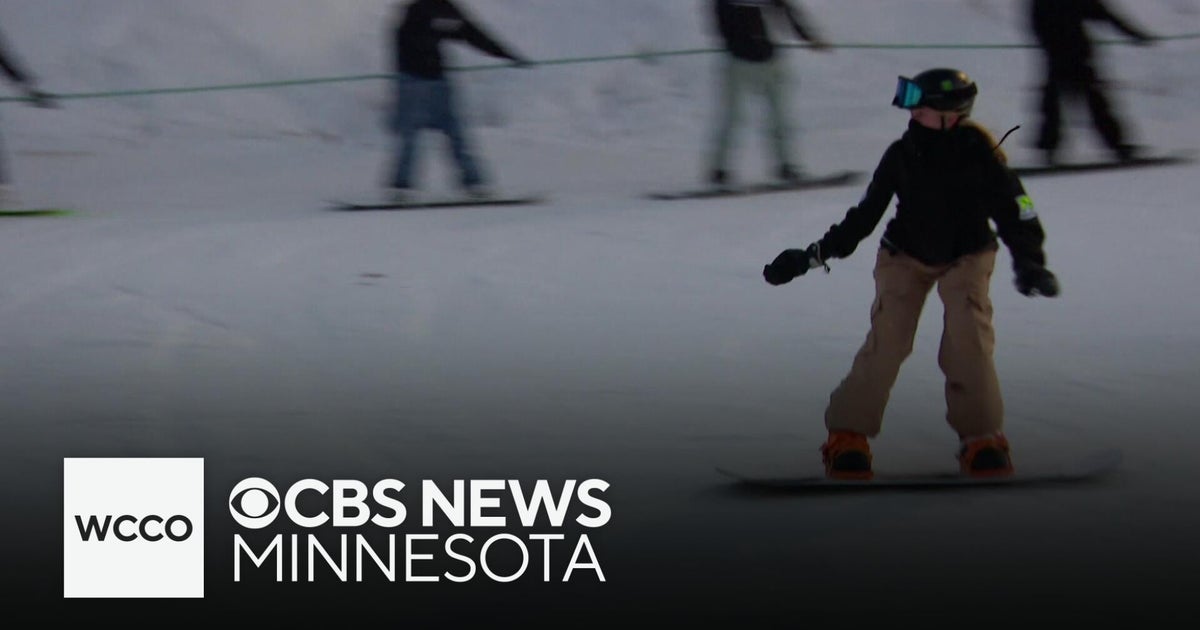 Minnesota snowboarder the slopes months after major spine surgery