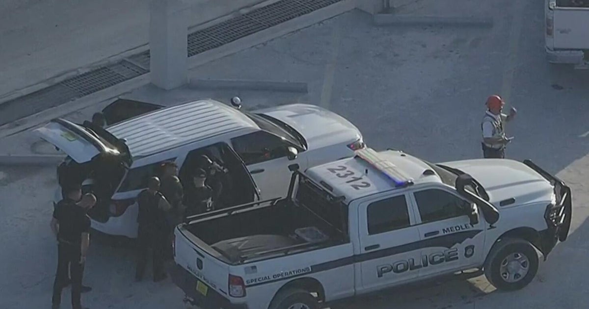 Man arrested for attacking a woman inside his car after police pursuit ended in Medley