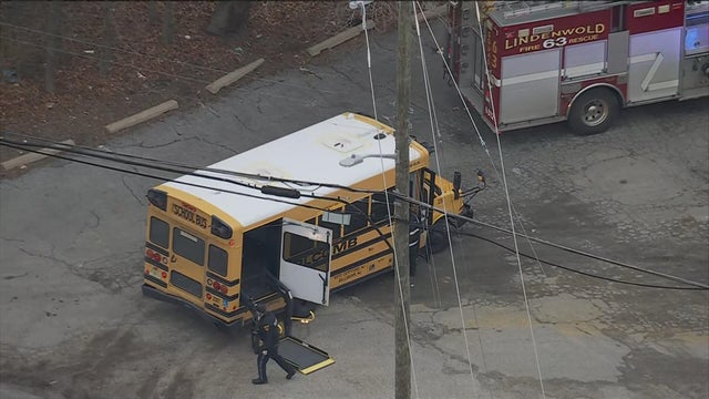 Overhead image of a school bus and a firetruck 
