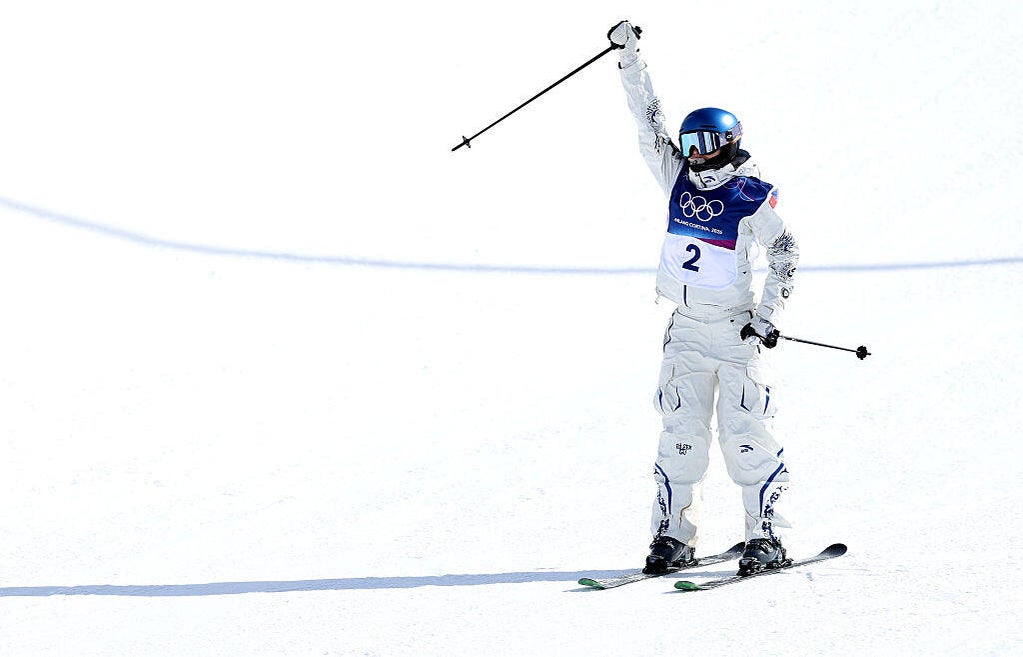 U.S.-born skier Eileen Gu defends Olympic ski halfpipe gold at Milano ...