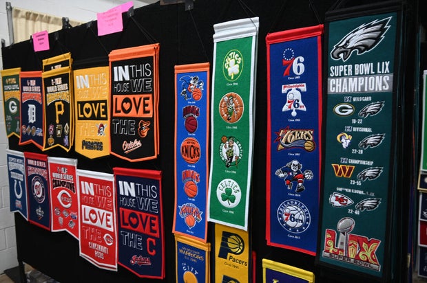 People pose for a photo at the opening day of the Philly Home and Garden show 