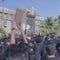 Woman in Tehran praises students for reigniting protests after bloody crackdown