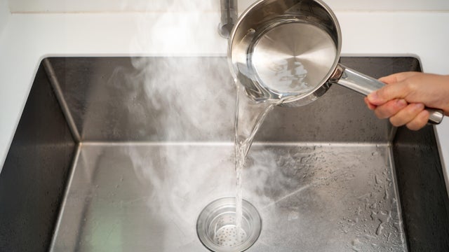 Avoid pouring hot water directly into a sink drain, especially if the pipes are made of PVC or if there are existing clogs, as it can cause damage to the plumbing system. 