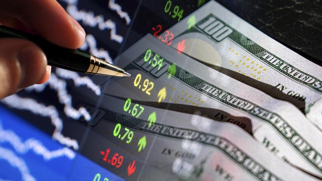 Financial Analysis Concept with Market Data and US Dollars 