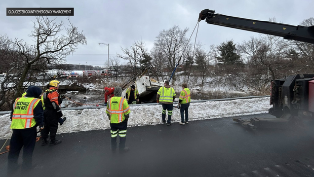 Overturned utility truck on Route 295 in West Deptford