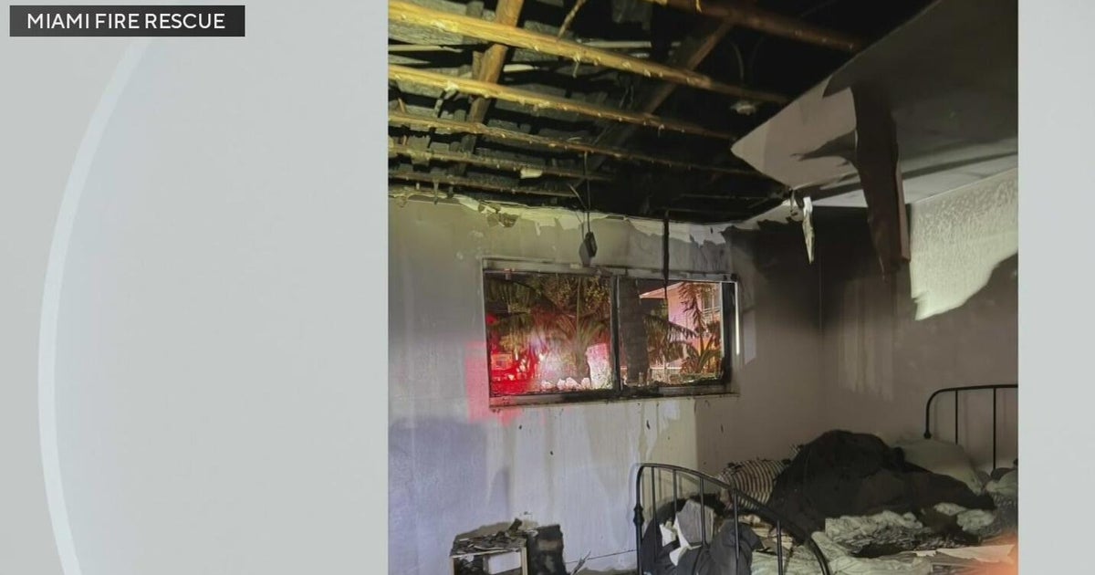 4 adults, 2 dogs displaced after Miami apartment fire - CBS Miami
