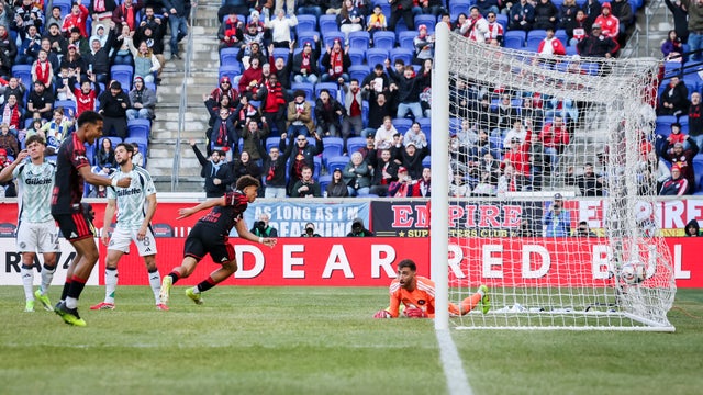 Julian Hall #16 of the New York Red Bulls hits the back of the net against Matt Turner #30 of the New England Revolution in the second half of the Major League Soccer at Sports Illustrated Stadium on February 28, 2026 in Harrison, New Jersey. 