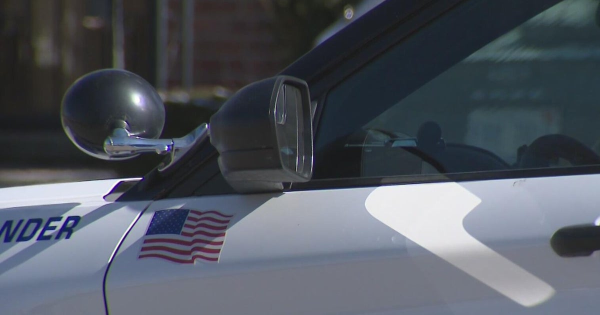 Man in custody after child found in impounded car in Metro Detroit ...