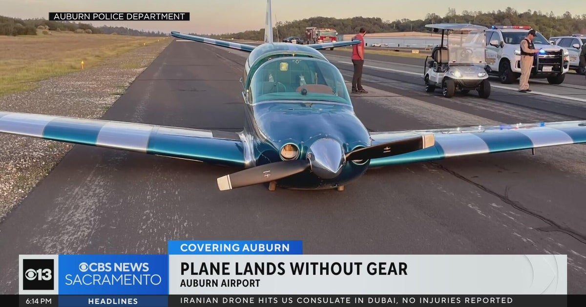 Small plane lands belly up on runway at Auburn airport