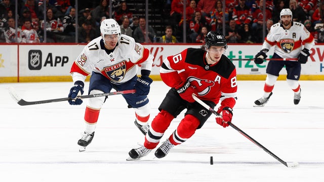 Jack Hughes #86 of the New Jersey Devils and Evan Rodrigues #17 of the Florida Panthers compete for the puck during the first period at Prudential Center on March 03, 2026 in Newark, New Jersey. 