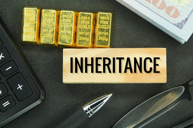 gold, banknotes and woody  boards with the connection     inheritance 