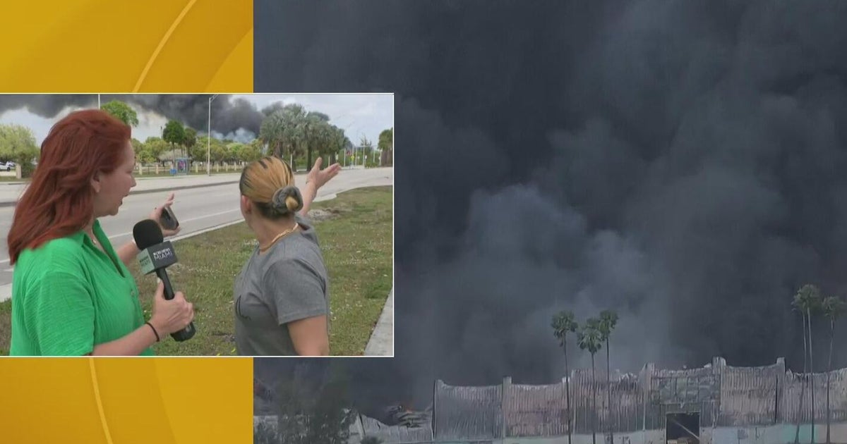 Residents near burning warehouse in northwest Miami-Dade worried as flames rage