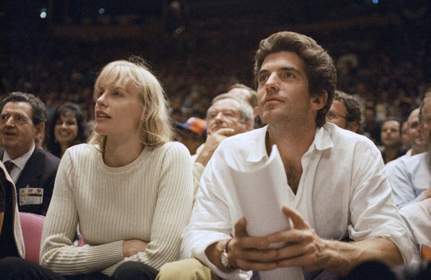 John F. Kennedy Jr. and Daryl Hannah sit court side during Game 3 of the NBA Finals between the New York Knicks and the Houston Rockets at New York's Madison Square Garden on June 12, 1994. 