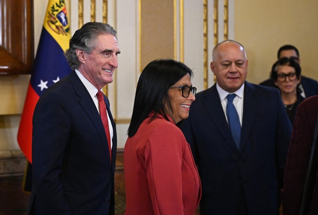 U.S. Interior Secretary Doug Burgum, left, Venezuela's acting President Delcy Rodríguez, center, and Minister of Interior, Justice and Peace Diosdado Cabello are seen at a meeting at the Miraflores Presidential Palace in Caracas on March 4, 2026. 