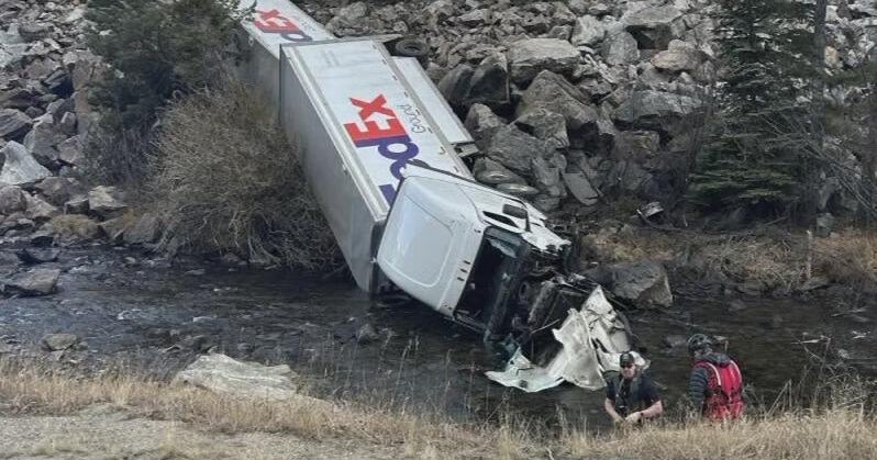 FedEx semi truck goes off Colorado's I-70, driver and passenger injured ...